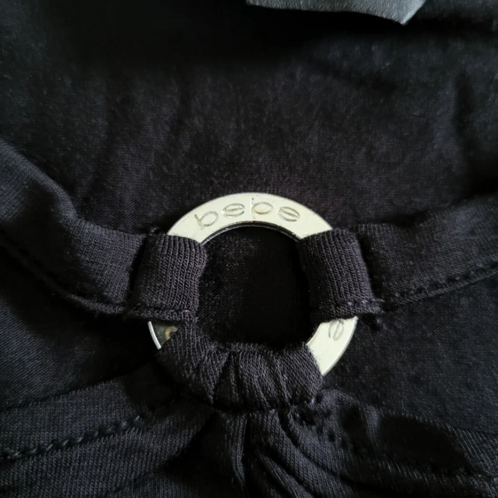 bebe Black🖤 Top with Silver🤍 O-Ring Detail - NWT - Picture 6 of 15